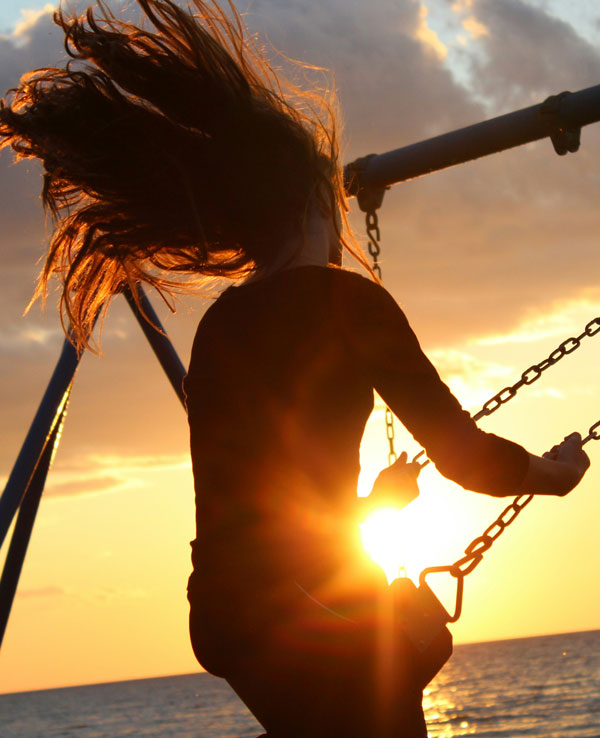 Woman Swinging with joy